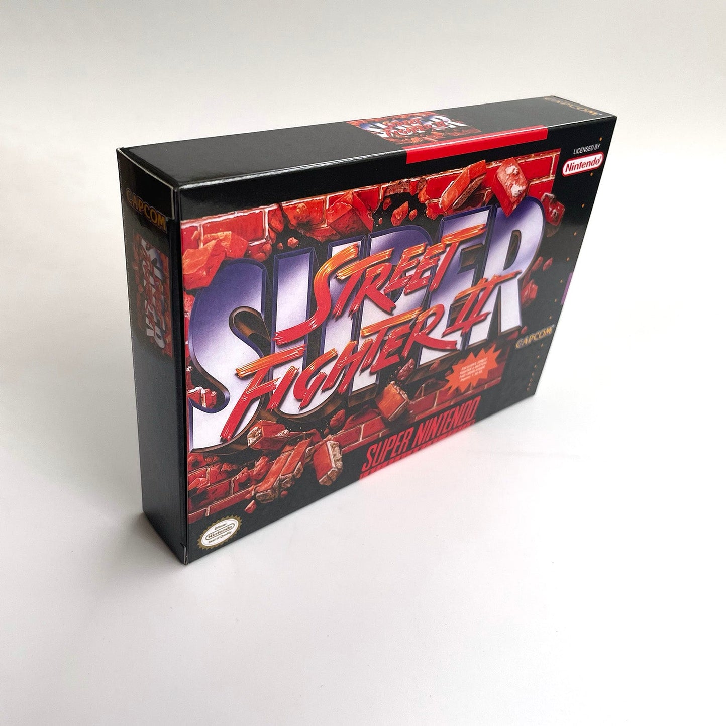 Angled view of Super Street Fighter II: The New Challengers SNES collector-style box.