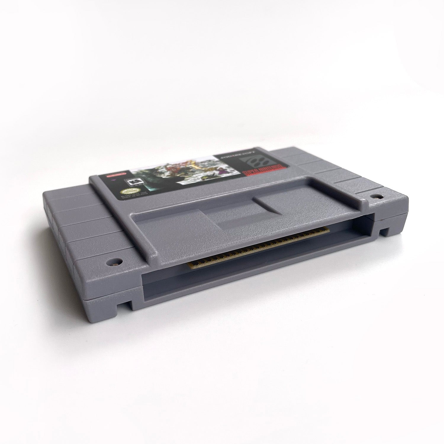 Bottom angled view of Chrono Trigger SNES cartridge.