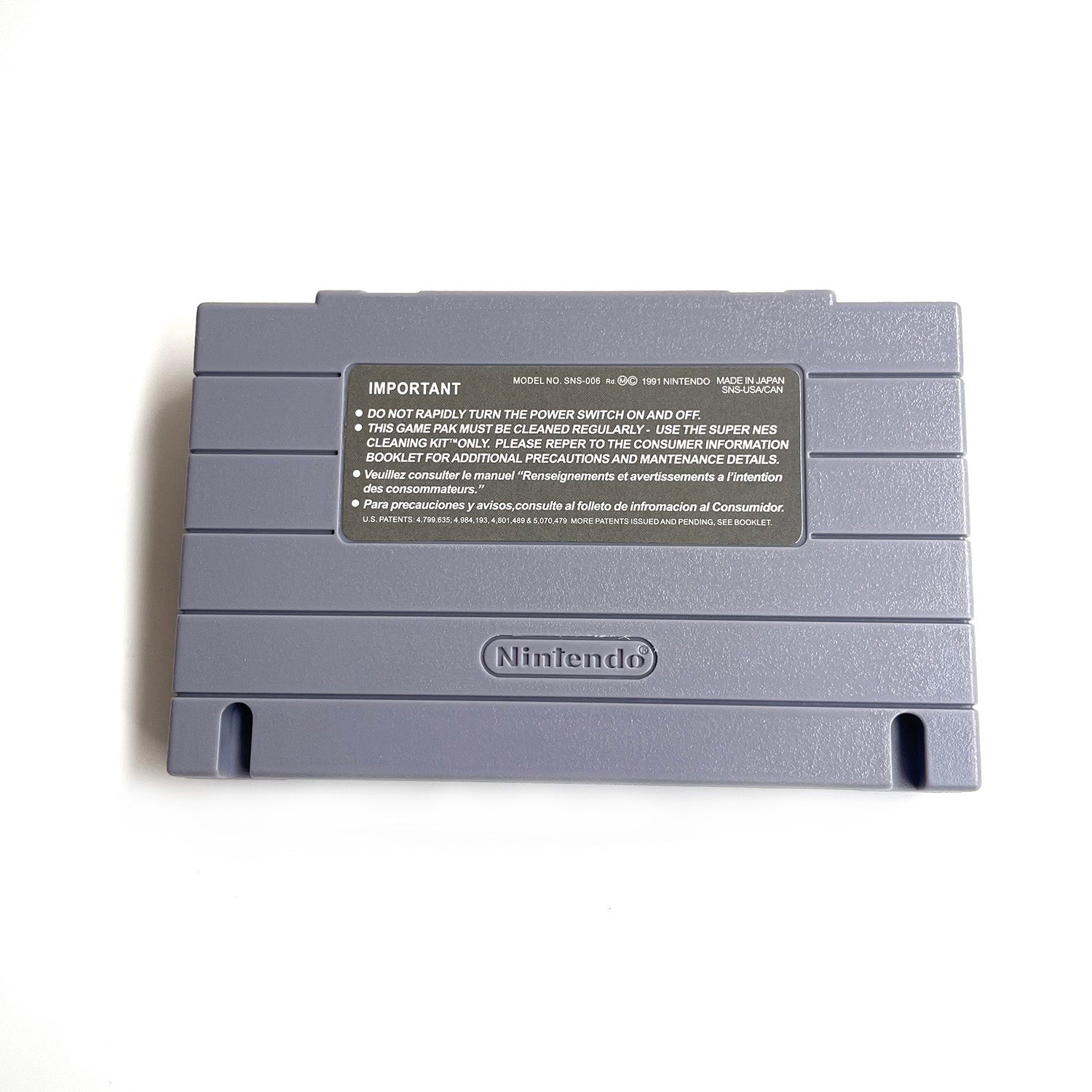 Back view of Super Street Fighter II: The New Challengers SNES cartridge.