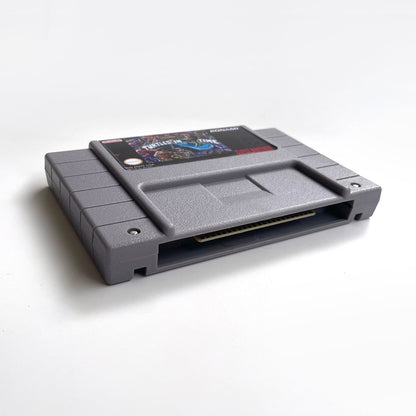 Bottom angled view of Teenage Mutant Ninja Turtles IV: Turtles in Time SNES cartridge.